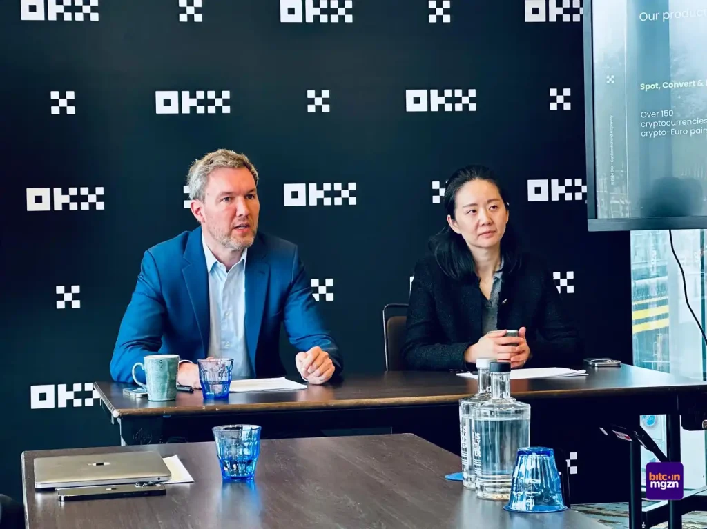 OKX President Hong Fang en Europees algemeen directeur Erald Ghoos